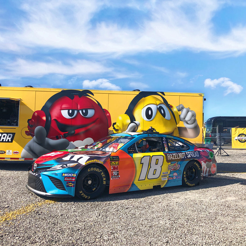 The M&M's car inside the Glampground
