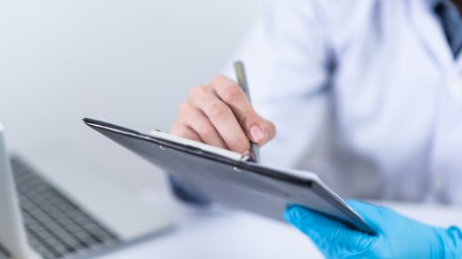 Doctor using a tablet in office