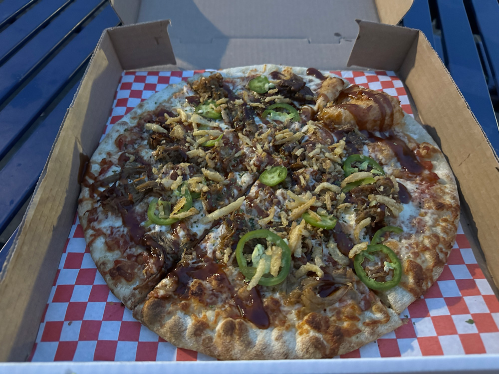 Pulled pork bbq pizza from Outlaws Smoke House at the Waterfront Container Village