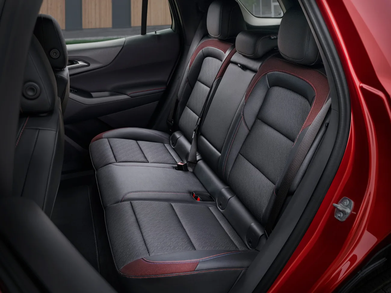 Rear cabin in a 2025 Chevrolet Equinox RS in Radiant Red Tintcoat