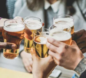 People cheers with beer