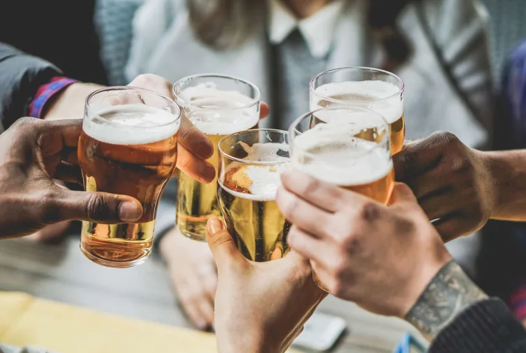 People cheers with beer