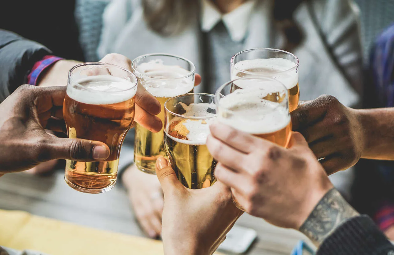 People cheers with beer