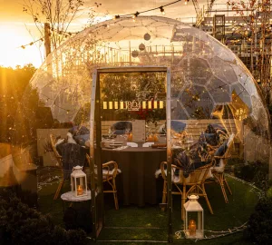 Heated Igloos and Festive Feasts Await at 1864 Rooftop Bar & Kitchen