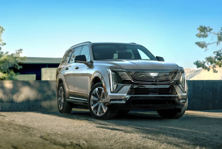 Front-angle view of the 2026 Cadillac Escalade IQL, an all-electric luxury SUV in a sleek black finish.