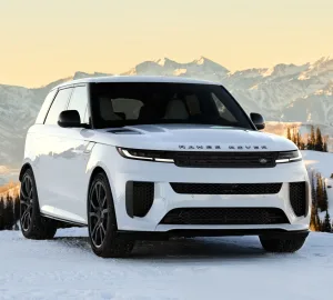 Range Rover Sport SV Park City Edition in Lyra White Gloss parked in alpine setting