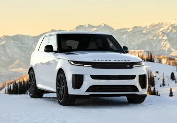 Range Rover Sport SV Park City Edition in Lyra White Gloss parked in alpine setting