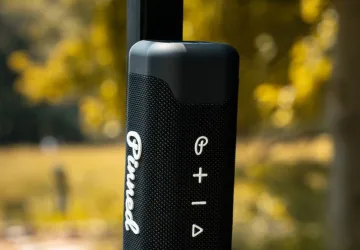 Pinned Golf Sound Stick Speaker attached to a golf cart