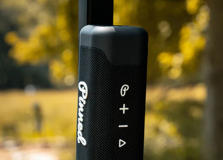 Pinned Golf Sound Stick Speaker attached to a golf cart