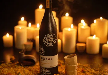 Bozal Cempasúchil Mezcal Reserva black ceramic bottle with marigold design