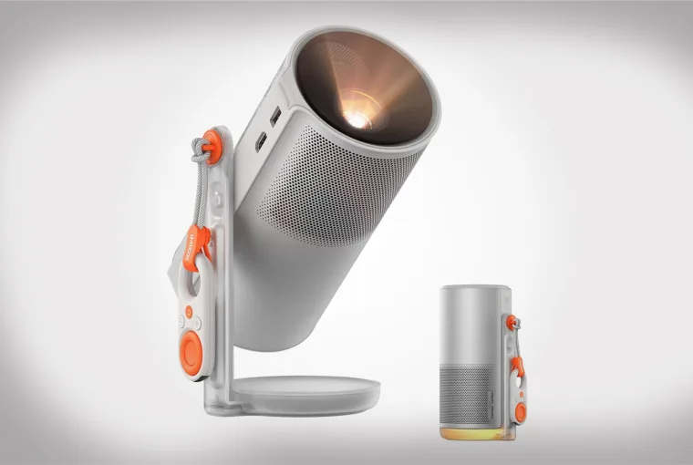 XGIMI MoGo 4 portable projector casting a movie on a tent during outdoor camping adventure