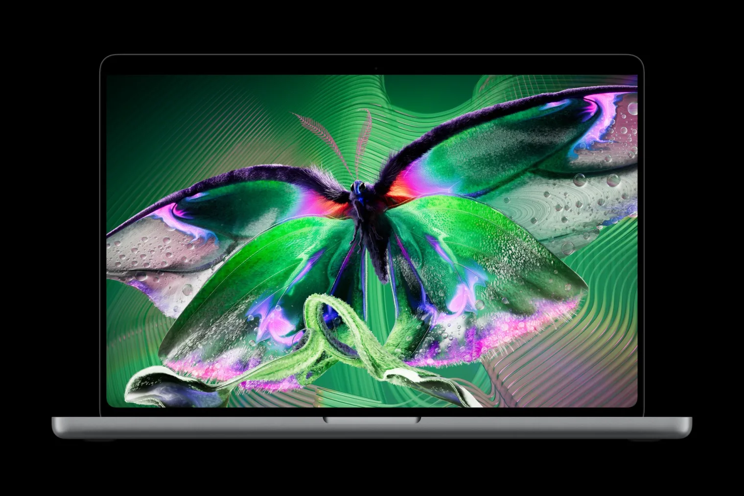 MacBook Pro with PROLED XDR Display showing a vibrant butterfly image