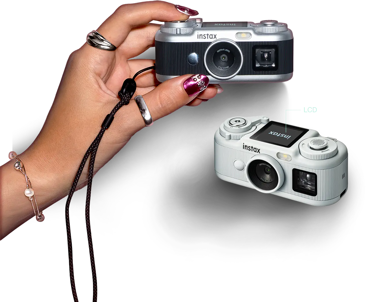 Fujifilm Instax Pal 2 palm-size digital camera held in a hand