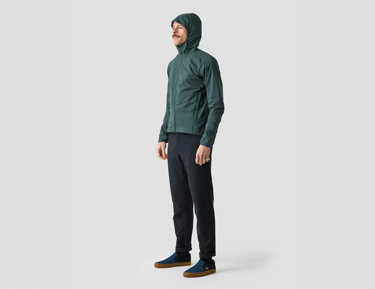 Ornot Fog Eater Hooded Rain Jacket in Stone Green, model front view