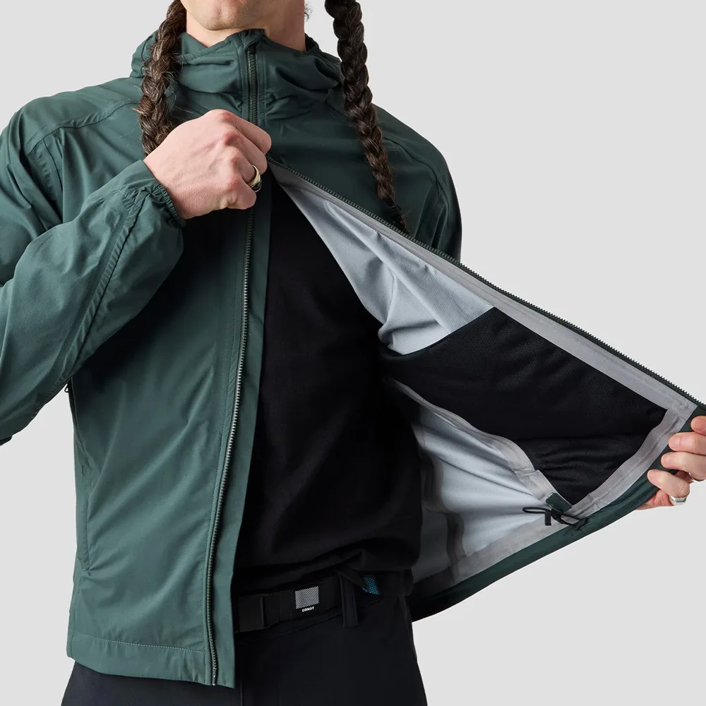 Ornot Fog Eater Hooded Rain Jacket in Stone Green, model front view