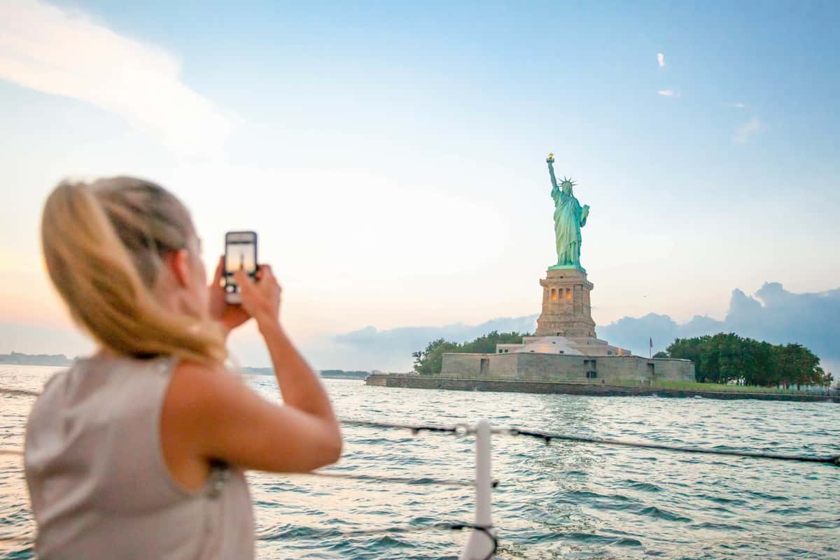 Ferry approaching Liberty Island and the Statue of Liberty in New York Harbor